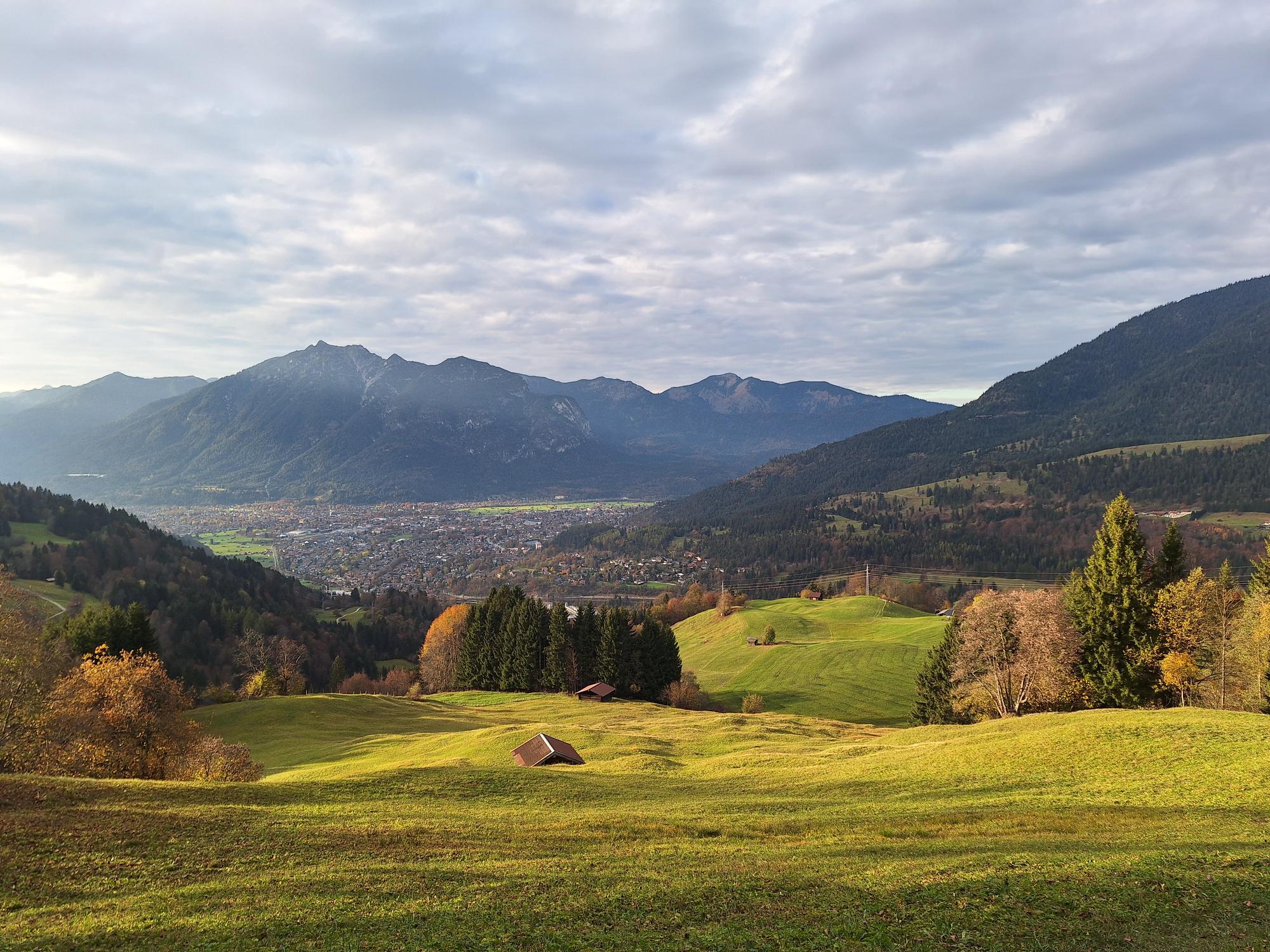 An impression from our hike around the Eckbauer with a view over Partenkirchen.
AI generated caption: Scenic landscape with rolling hills, forest, and distant mountains. An impression from our hike around the Eckbauer with a view over Partenkirchen.
AI generated caption: Scenic landscape with rolling hills, forest, and distant mountains.
